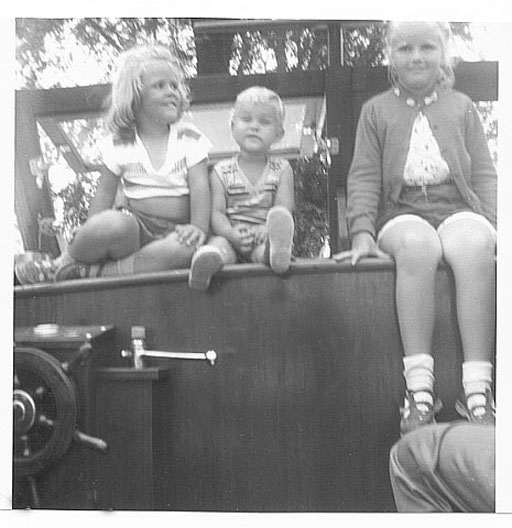 Darleen, Alan and Mariana on Grandpa Schulte's boat